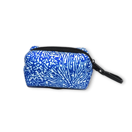 Blue and white abstract patterned poop bag holder on a white background