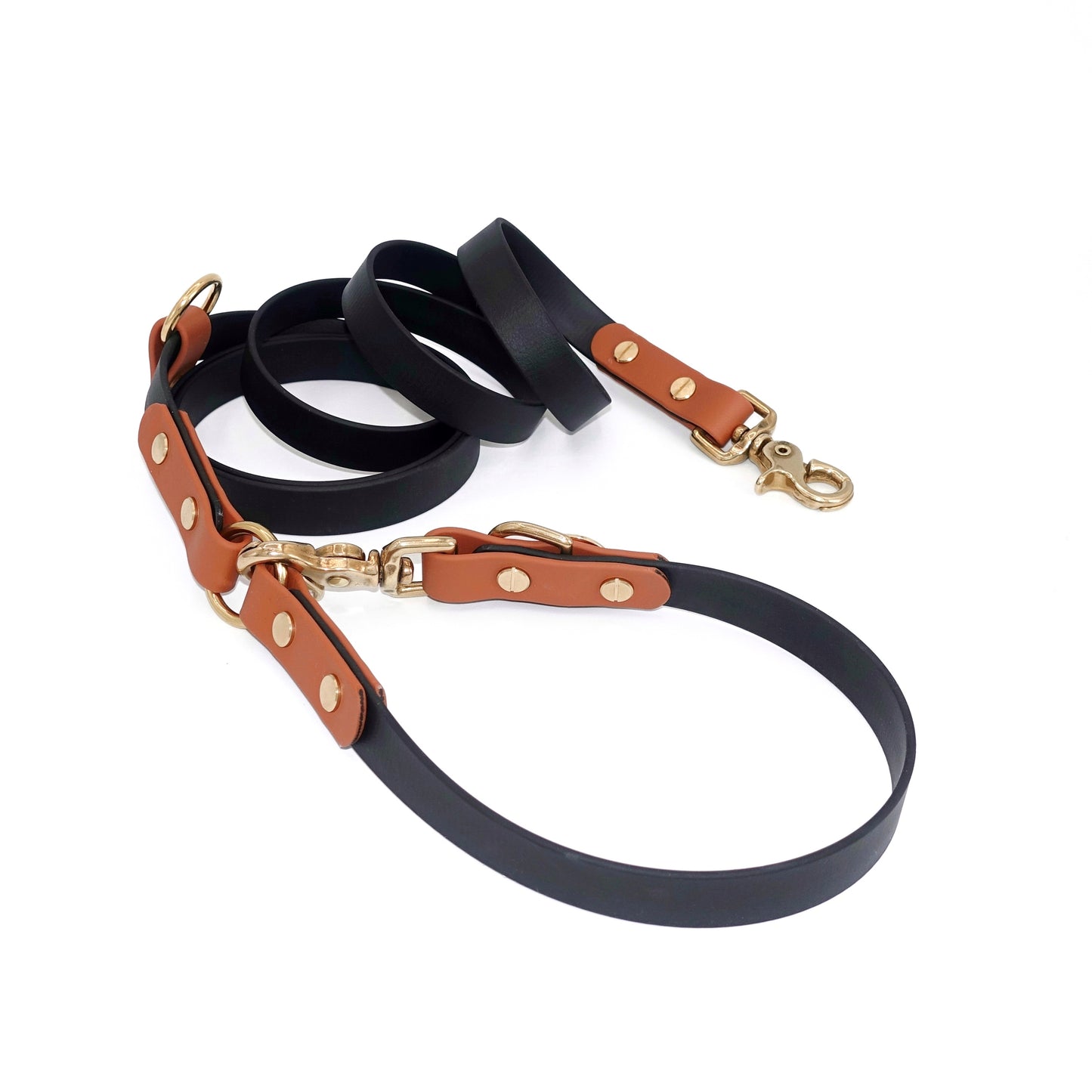 Biothane hands-free dog leash with gold hardware, waterproof and wearable crossbody, black tan