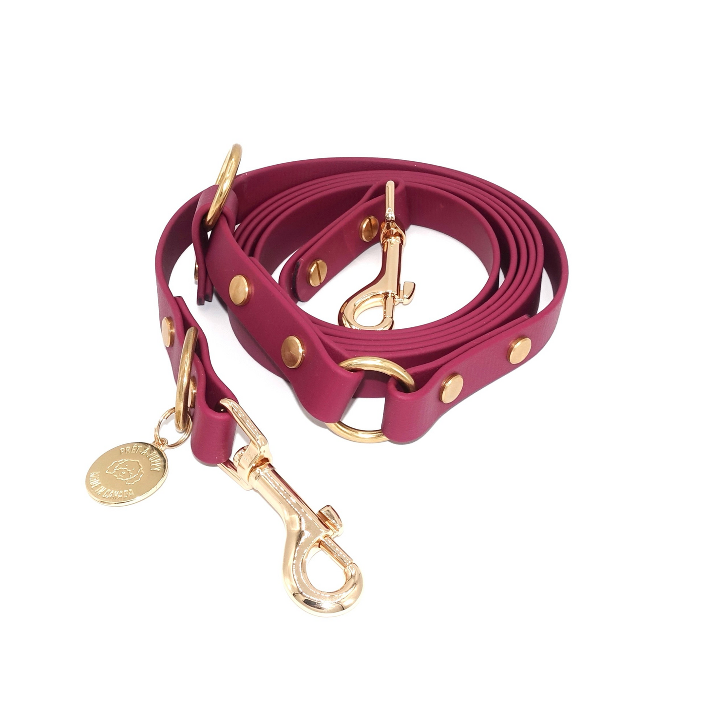 Burgundy Biothane hands-free dog leash with gold hardware, waterproof and wearable crossbody or around the waist