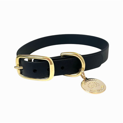 Stylish black dog collar made from high-quality vegan leather, featuring elegant gold hardware. This waterproof collar is soft to the touch, ensuring comfort for your pet while providing durability for everyday use. Ideal for pet owners looking for a fashionable, and long-lasting accessory for their dog.