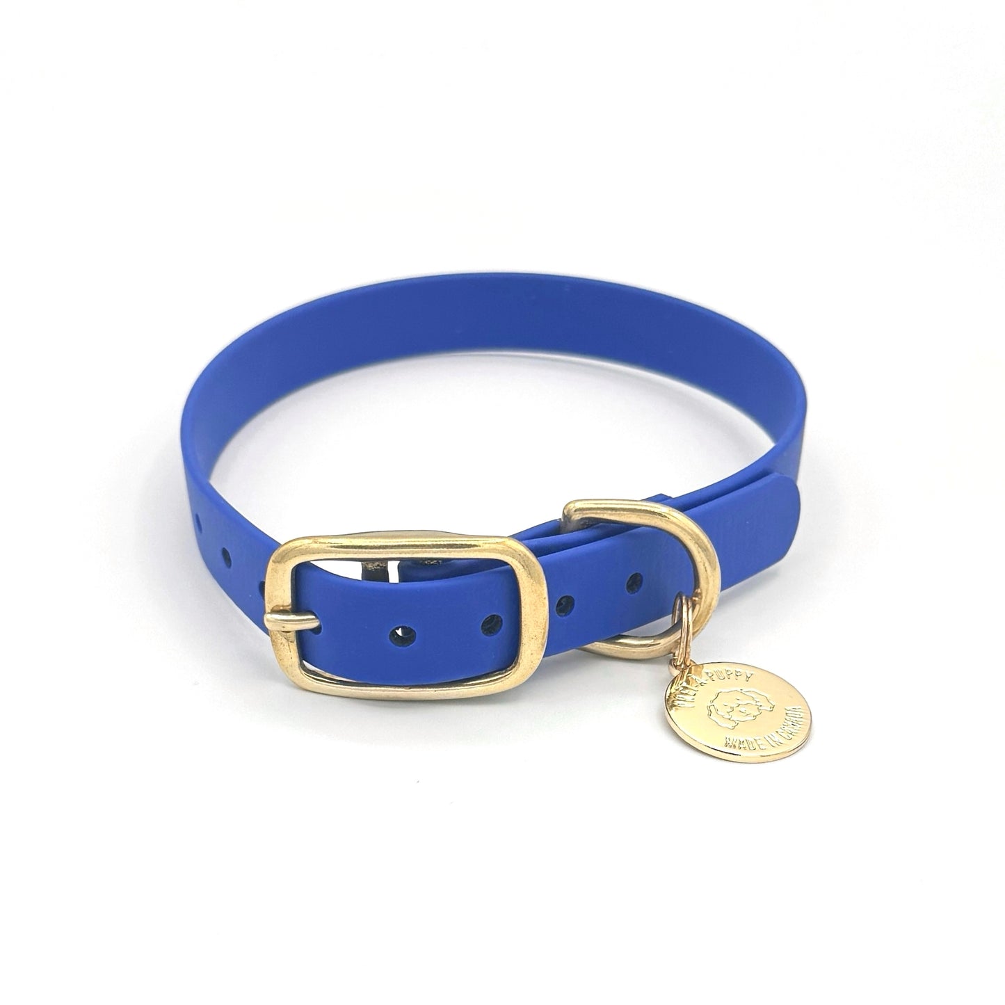 Stylish royal blue dog collar made from high-quality vegan leather, featuring elegant gold hardware. This waterproof collar is soft to the touch, ensuring comfort for your pet while providing durability for everyday use. Ideal for pet owners looking for a fashionable, and long-lasting accessory for their dog.