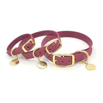 Stylish burgundy dog collar made from high-quality vegan leather, featuring elegant gold hardware. This waterproof collar is soft to the touch, ensuring comfort for your pet while providing durability for everyday use. Ideal for pet owners looking for a fashionable, and long-lasting accessory for their dog.