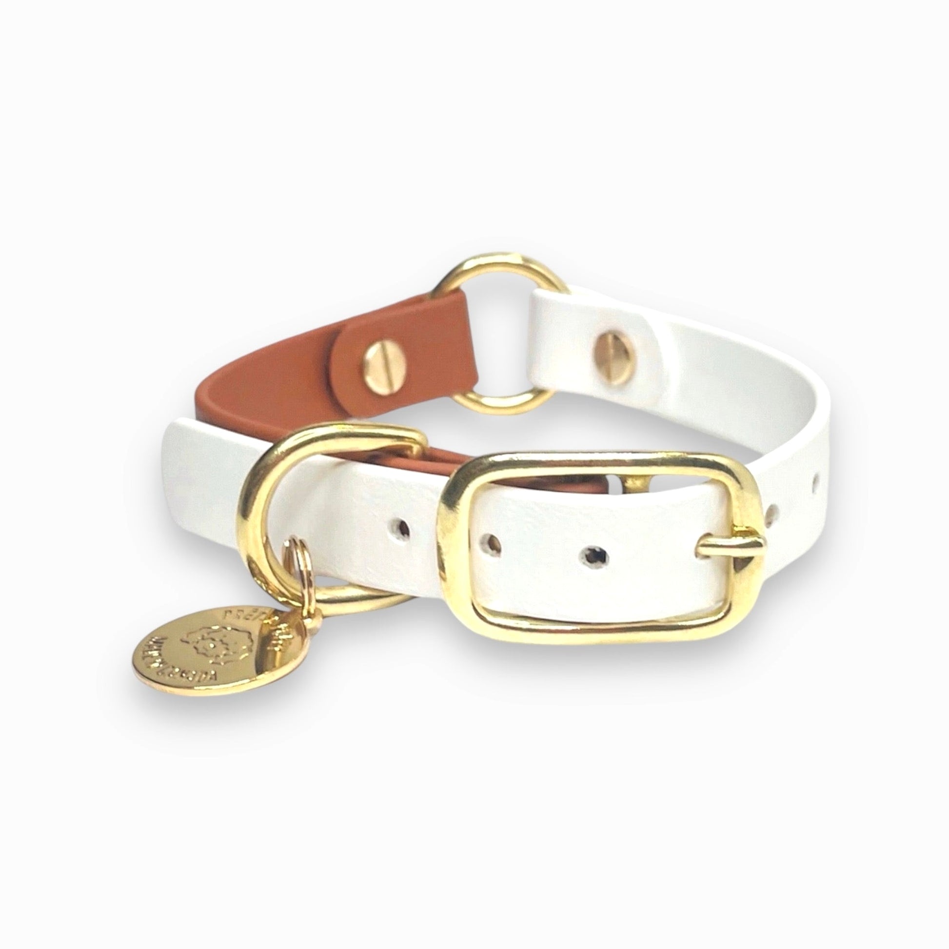 Stylish custom two tone dog collar made from high-quality vegan leather, featuring elegant gold hardware. This waterproof collar is soft to the touch, ensuring comfort for your pet while providing durability for everyday use. Ideal for pet owners looking for a fashionable, and long-lasting accessory for their dog.