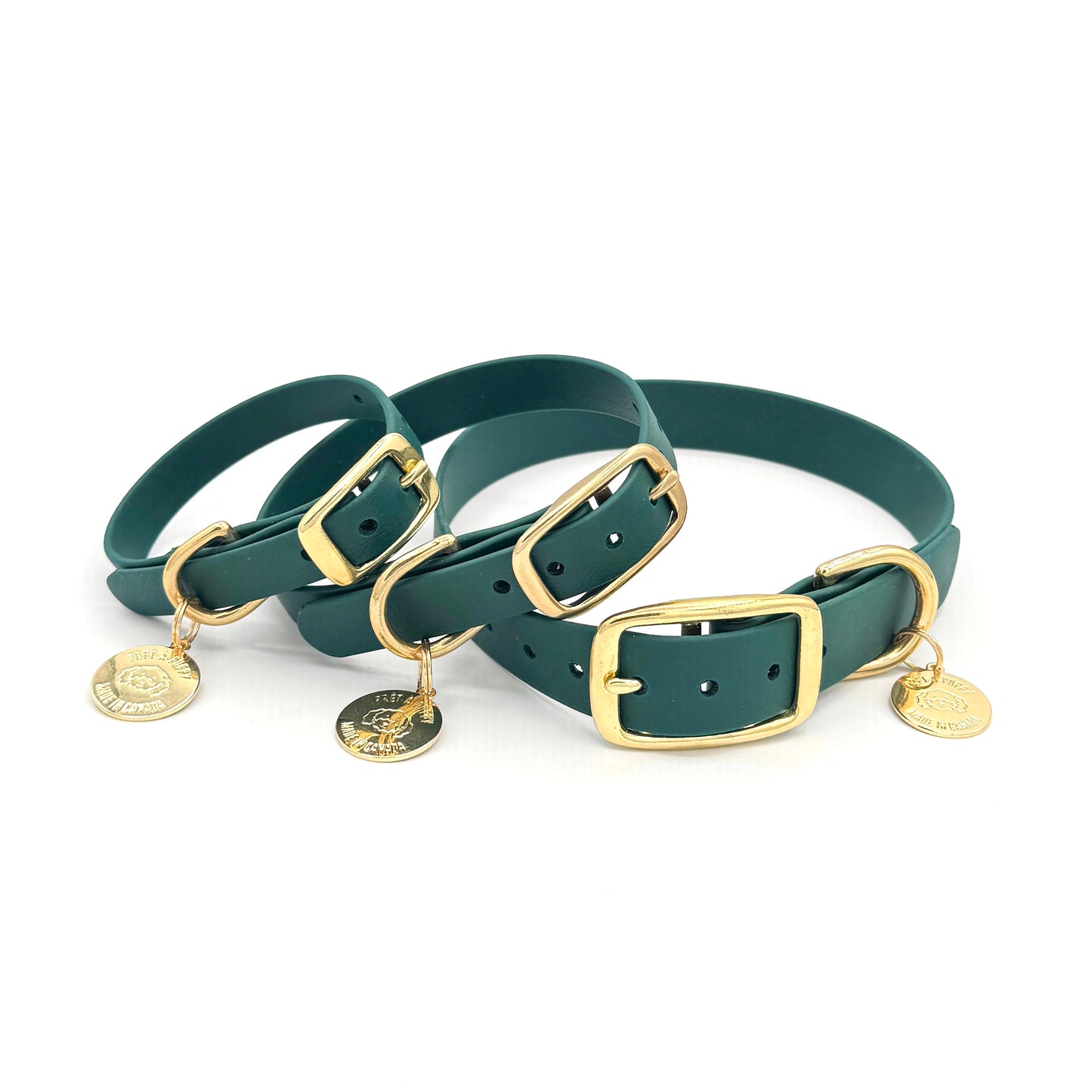 Stylish forest green dog collar made from high-quality vegan leather, featuring elegant gold hardware. This waterproof collar is soft to the touch, ensuring comfort for your pet while providing durability for everyday use. Ideal for pet owners looking for a fashionable, and long-lasting accessory for their dog.