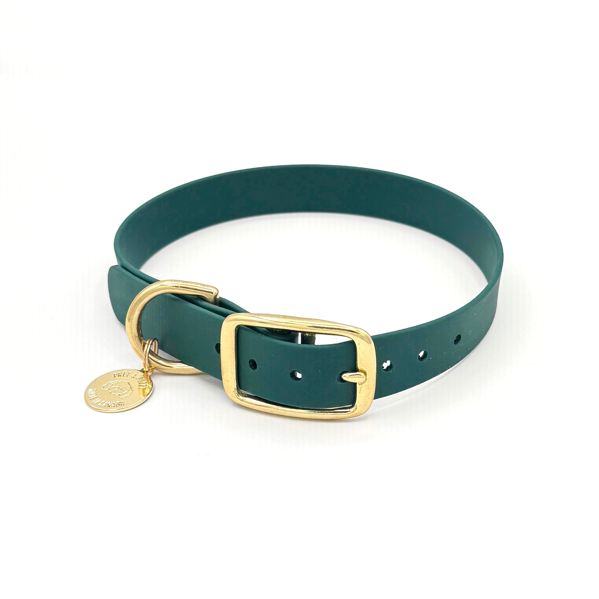 Stylish forest green dog collar made from high-quality vegan leather, featuring elegant gold hardware. This waterproof collar is soft to the touch, ensuring comfort for your pet while providing durability for everyday use. Ideal for pet owners looking for a fashionable, and long-lasting accessory for their dog.