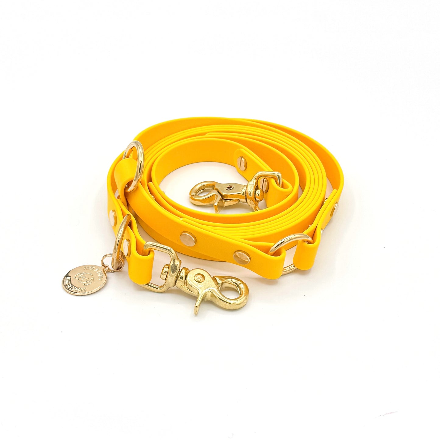 Yellow Biothane hands-free dog leash with gold hardware, waterproof and versatile for waist or crossbody wear