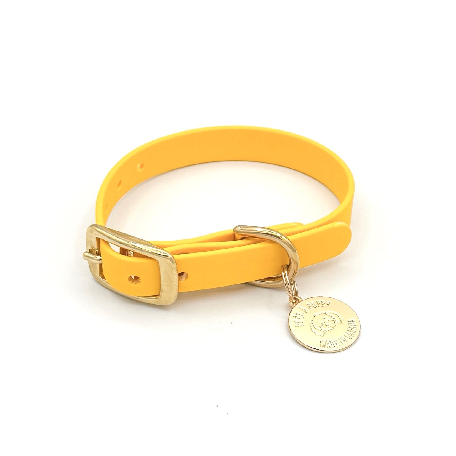 Stylish yellow dog collar made from high-quality vegan leather, featuring elegant gold hardware. This waterproof collar is soft to the touch, ensuring comfort for your pet while providing durability for everyday use. Ideal for pet owners looking for a fashionable, and long-lasting accessory for their dog.