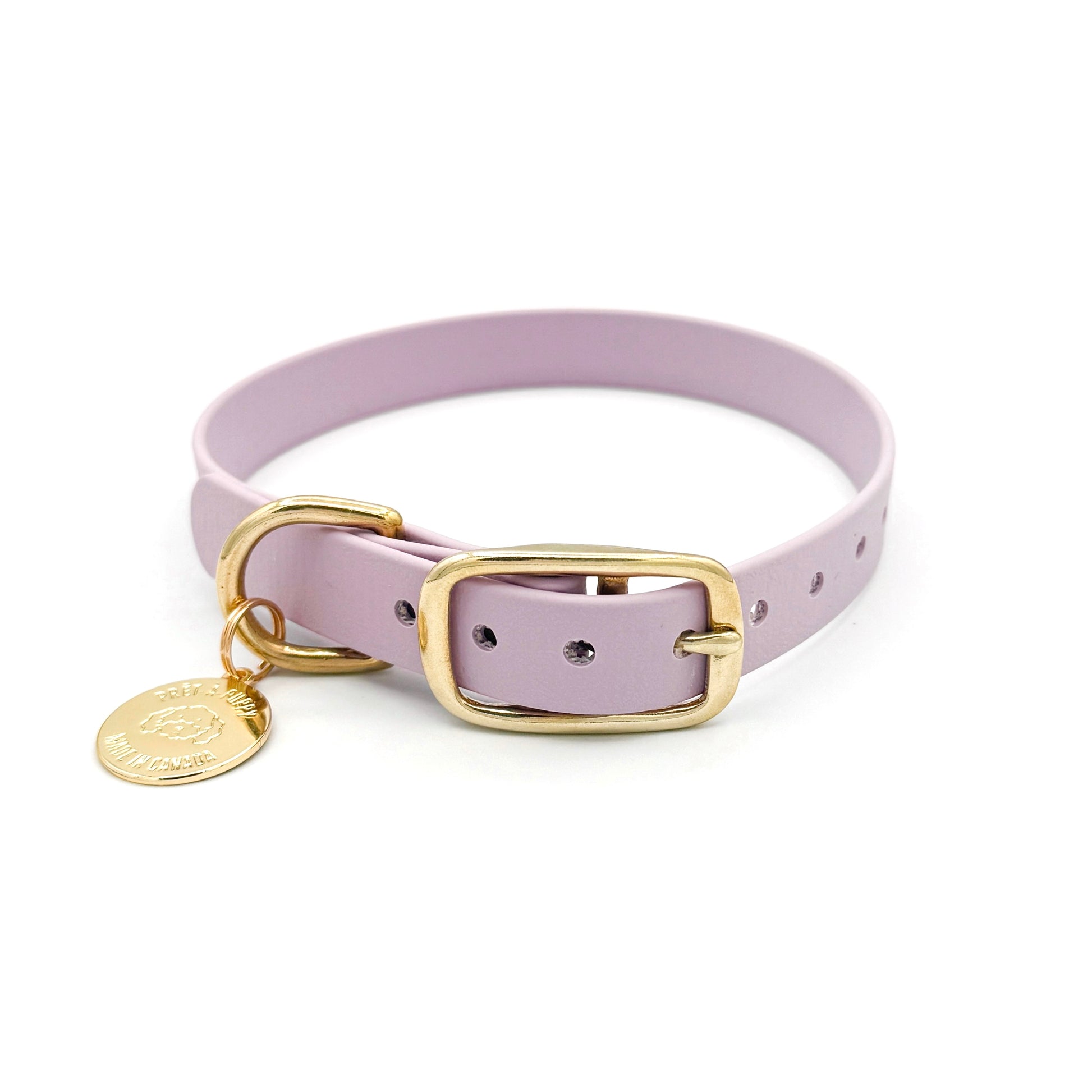 Stylish lilac light purple dog collar made from high-quality vegan leather, featuring elegant gold hardware. This waterproof collar is soft to the touch, ensuring comfort for your pet while providing durability for everyday use. Ideal for pet owners looking for a fashionable, and long-lasting accessory for their dog.