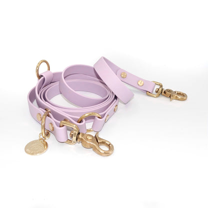 Lilac Biothane hands-free dog leash with gold hardware, waterproof and versatile for waist or crossbody wear 