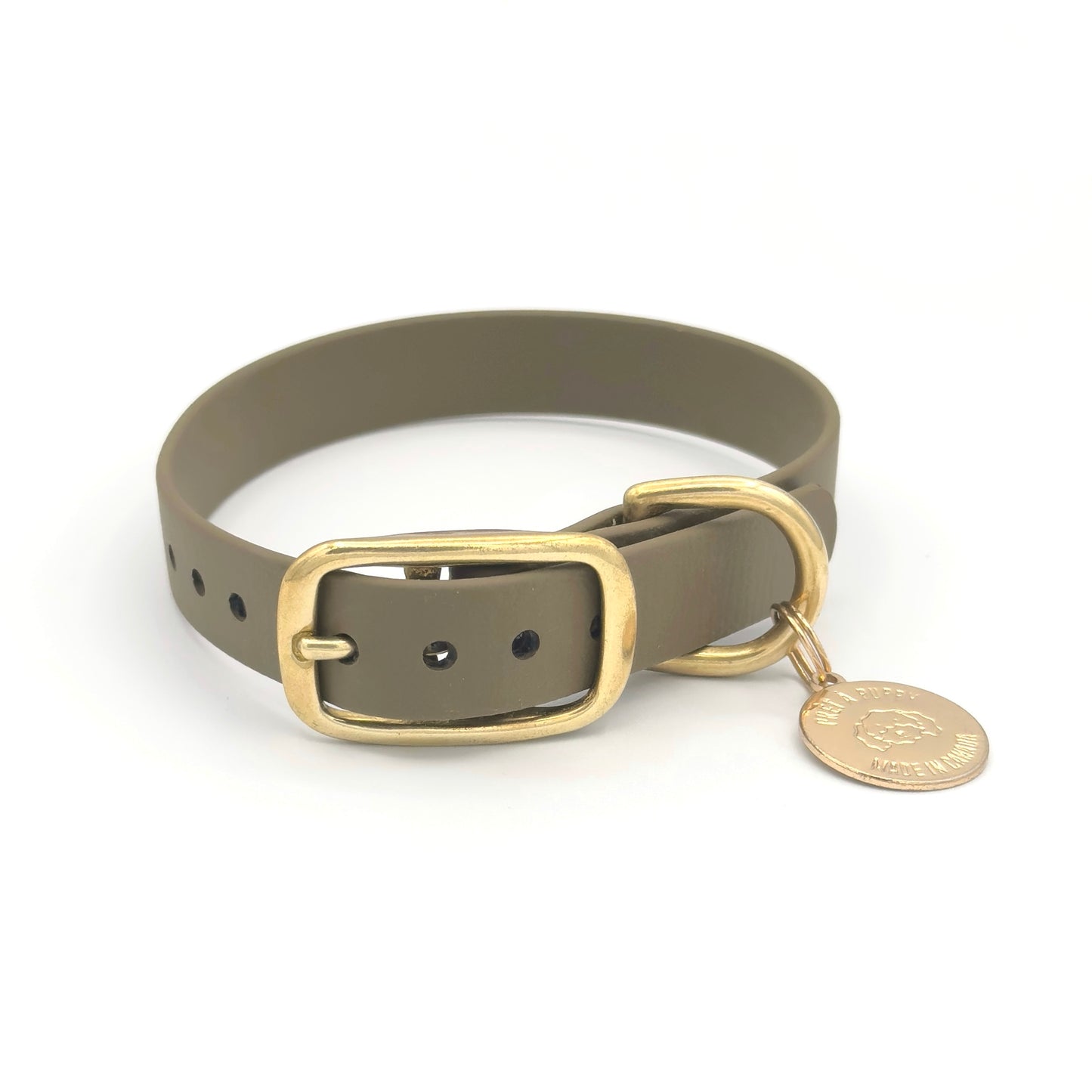 Stylish olive green dog collar made from high-quality vegan leather, featuring elegant gold hardware. This waterproof collar is soft to the touch, ensuring comfort for your pet while providing durability for everyday use. Ideal for pet owners looking for a fashionable, and long-lasting accessory for their dog.