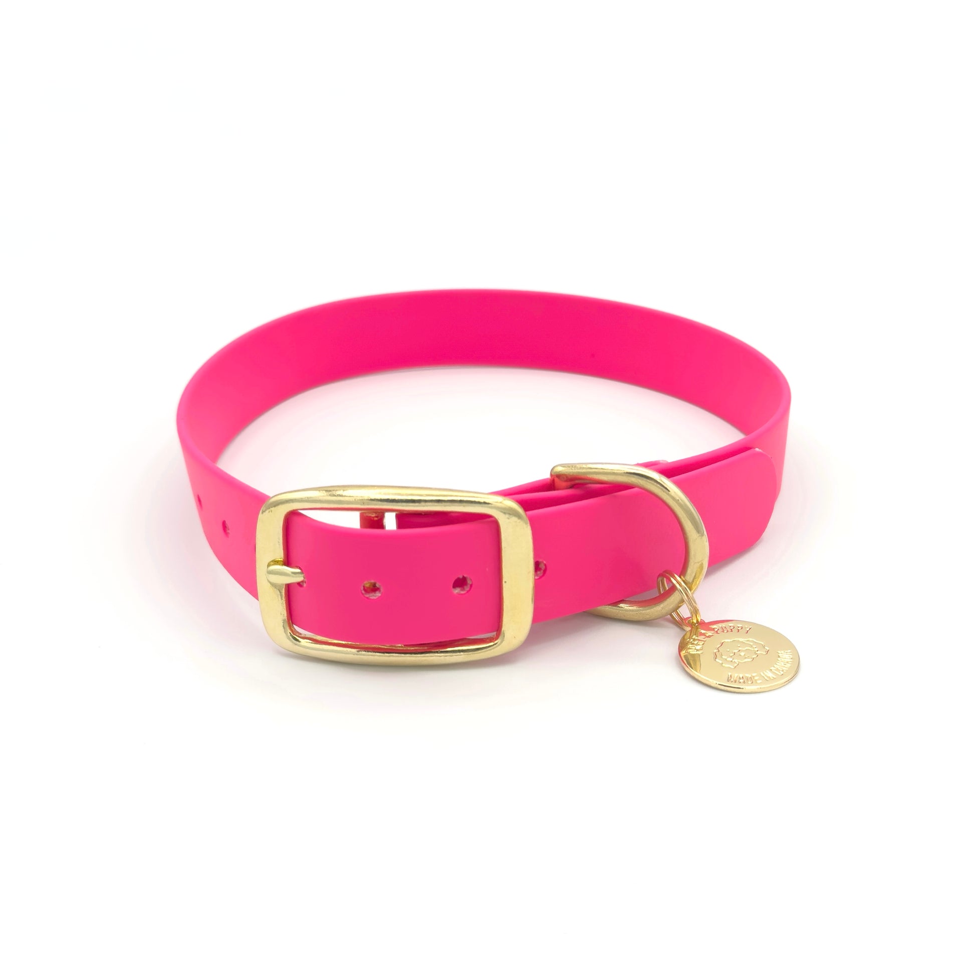 Stylish hot pink dog collar made from high-quality vegan leather, featuring elegant gold hardware. This waterproof collar is soft to the touch, ensuring comfort for your pet while providing durability for everyday use. Ideal for pet owners looking for a fashionable, and long-lasting accessory for their dog.