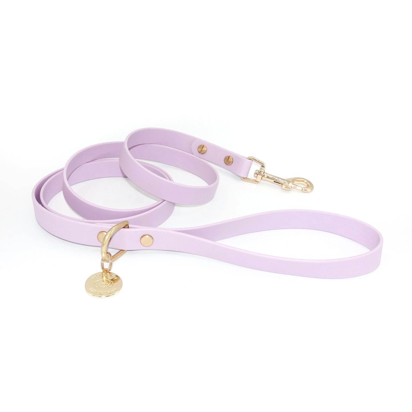 Lavender dog leash with gold hardware on a white background